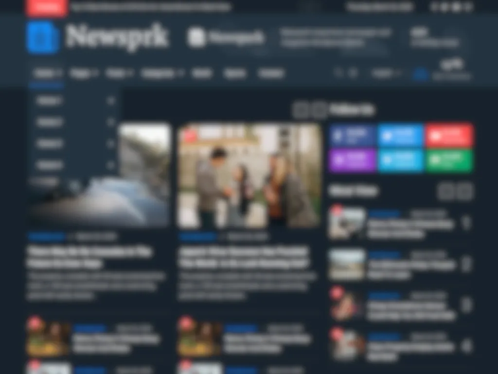 Computer screen displaying a modern news website with articles, headlines, and images.